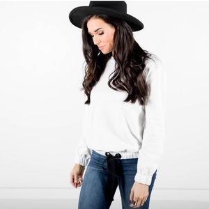 Shop Stevie tie sweater